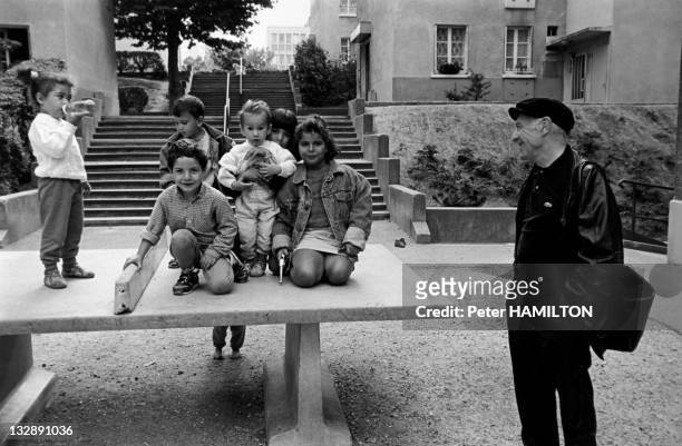 Photographer Robert Doisneau with children playing in a park during October 1992, in Montrouge Hauts de Seine, France.