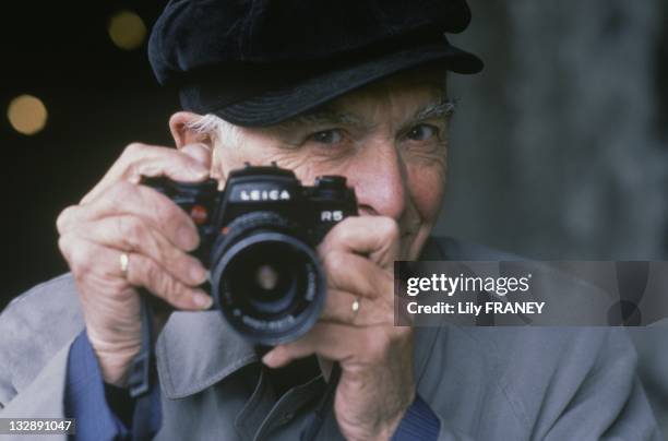 Photographer Robert Doisneau with his Leica camera during 1992 in France.