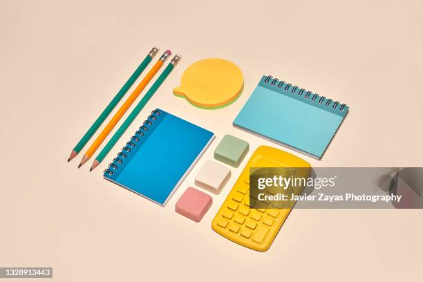 stationery on pastel background - note pad and pencil stock pictures, royalty-free photos & images