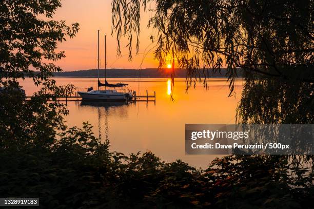 scenic view of lake against sky during sunset,brainerd,minnesota,united states,usa - brainerd stock pictures, royalty-free photos & images