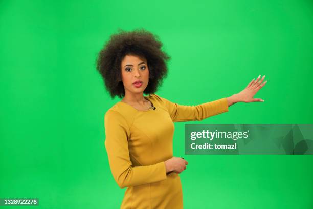 weather forecaster on green background - chroma key stock pictures, royalty-free photos & images