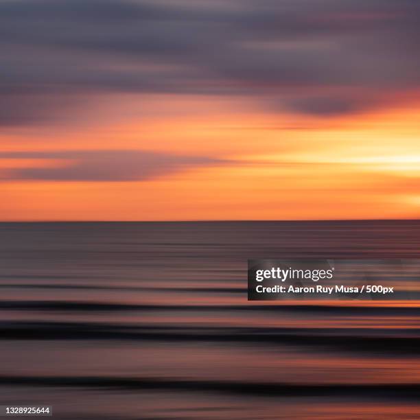 scenic view of sea against dramatic sky during sunset,valladolid,negros occidental,philippines - negros occidental stock pictures, royalty-free photos & images