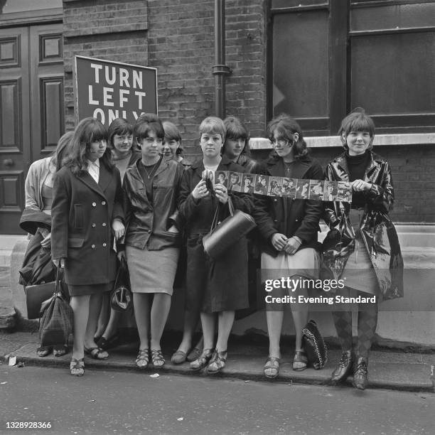 Female fans of rock group the Rolling Stones wait outside West Ham Magistrates Court in London, where their idols are making a court appearance after...