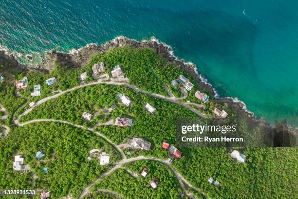aerial over homes overlooking magens bay in st. thomas - caribbean culture stock pictures, royalty-free photos & images