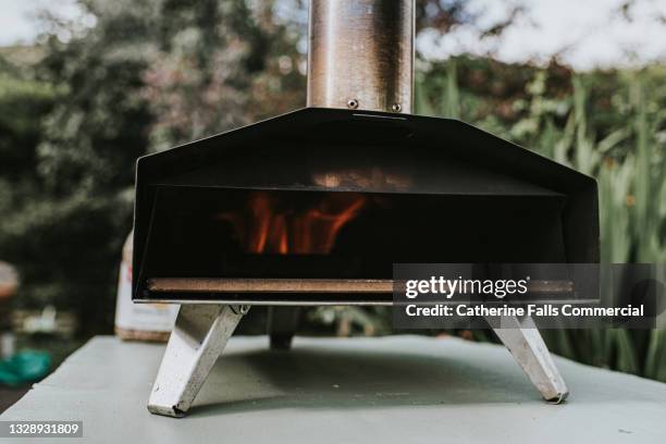 a domestic pizza oven in an outdoor environment - small garden stock pictures, royalty-free photos & images