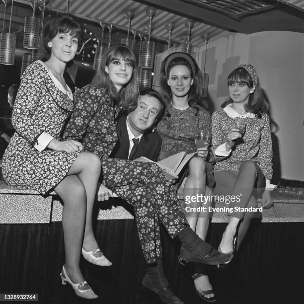 English playwright Wolf Mankowitz with actresses Pauline Collins, Jane Birkin, Francesca Annis and Jean Muir, UK, 24th August 1965. The woman are...
