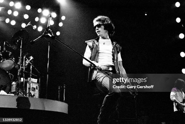 View of English Rock & Blues musician Paul Rodgers, of the band Bad Company, on vocals as he performs, during the 'Desolation Angels' tour, onstage...