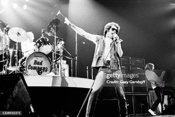 View of English Rock & Blues musician Paul Rodgers, of the band Bad Company, on vocals as he performs, during the 'Desolation Angels' tour, onstage...