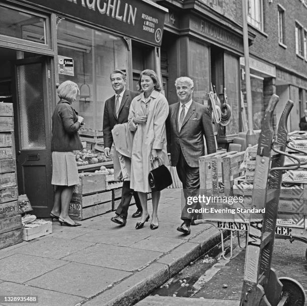 From left to right, actors Michael Redgrave , Ingrid Bergman and Emlyn Williams walking together in London, UK, 13th September 1965. They are...