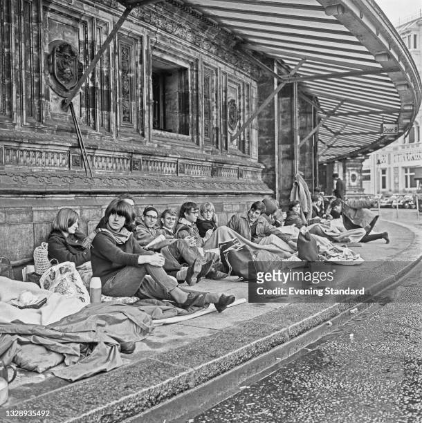 People queuing up outside the Royal Albert Hall in London for the Last Night Of The Proms, UK, 15th September 1965.