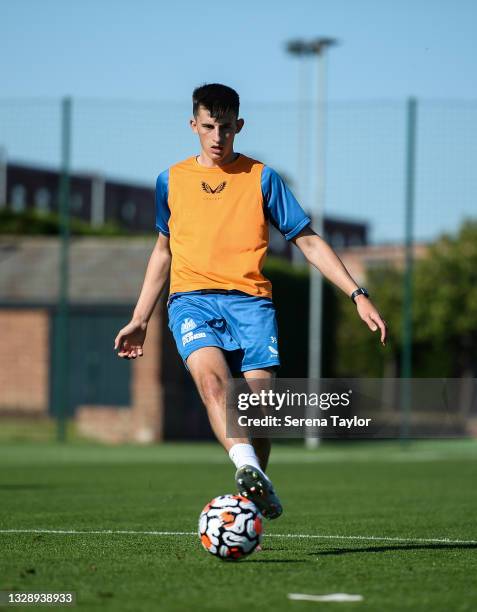 Kelland Watts passes the ball during the Newcastle United Pre Season Training Session at Queen Ethelburga's Collegiate on July 15, 2021 in York,...