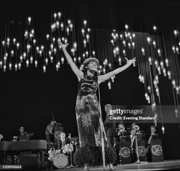 Welsh singer Shirley Bassey on stage during the Royal Variety Performance at the London Palladium in London, UK, 8th November 1965.