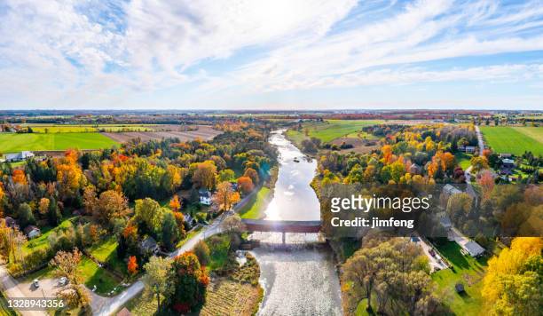 aerial west montrose covered bridge  and grand river near kitchener, west montrose, canada - kissing bridge - ontario canada stock pictures, royalty-free photos & images