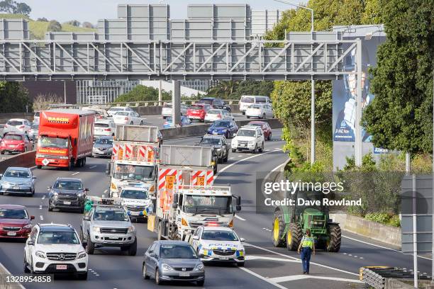 Tractors being driven by farmers and protesters on the motorway into Auckland causing congestion as they express their views on July 16, 2021 in...