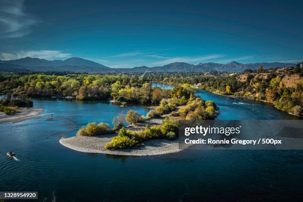 scenic view of river by mountains against sky,redding,california,united states,usa - redding califórnia imagens e fotografias de stock