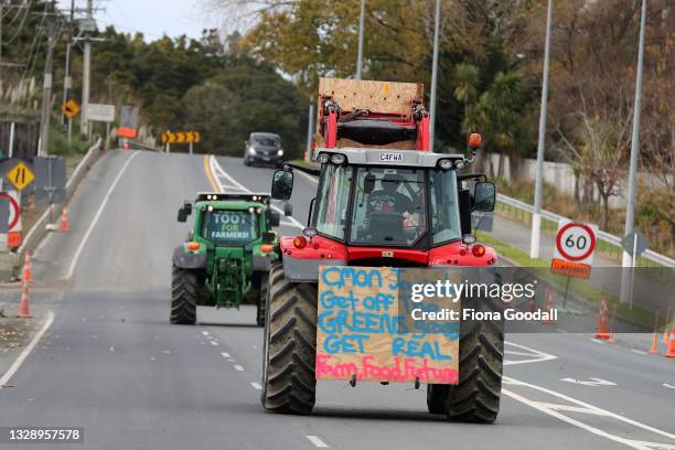 Farmers leave Warkworth in convoy on July 16, 2021 in Auckland, New Zealand. Farmers and rural residents are protesting around New Zealand over new...