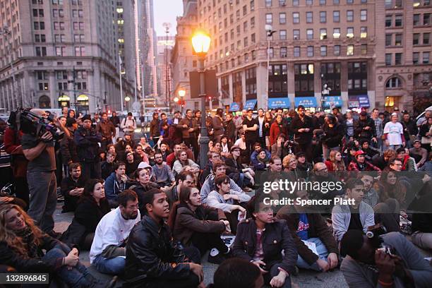 Occupy Wall Street protesters regroup in Foley Square after New York City police in riot gear removed the protesters from Zuccotti Park early on...