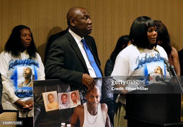 Byron Williams' niece Teena Acree looks on as civil rights attorney Ben Crump holds a photo of Byron Williams as Williams' sister Robyn Willams...