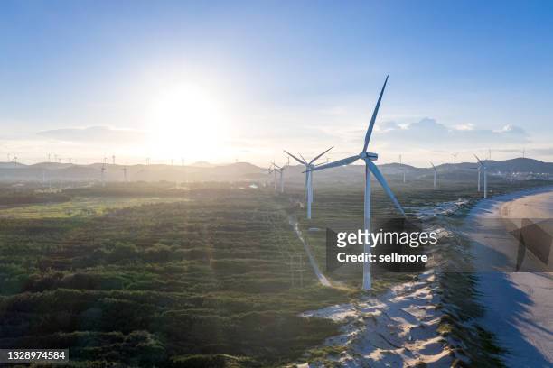 aerial view of wind farm - australia economy stock-fotos und bilder