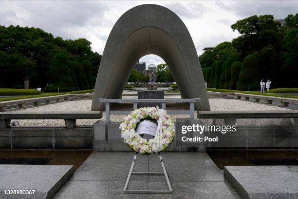 The wreath which International Olympic Committee President Thomas Bach offered is seen in front of the cenotaph at the Hiroshima Peace Memorial Park...