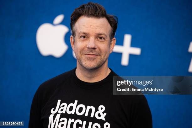 Jason Sudeikis wears a top featuring the names of England football players Jadon Sancho, Marcus Rashford and Bukayo Saka as he attends Apple's "Ted...