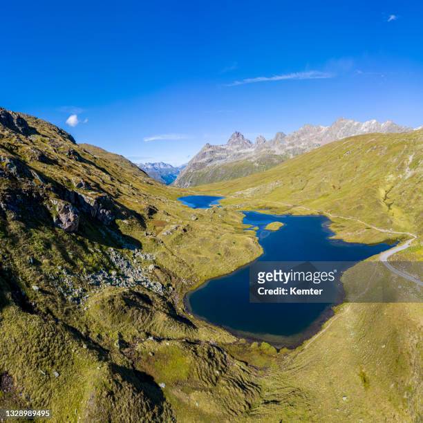 aerial view of a beautiful small lake in the mountains - vorarlberg imagens e fotografias de stock