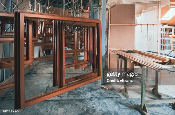 handmade custom wooden window frames stacked together - windowframe stockfoto's en -beelden