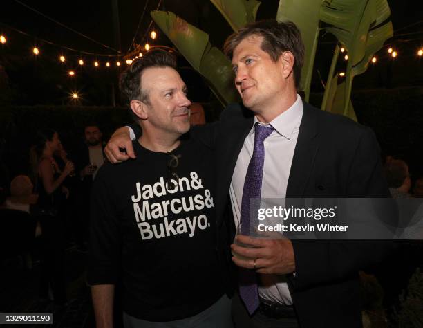 Jason Sudeikis and Bill Lawrence pose at the after party for Apple's "Ted Lasso" Season 2 at Cecconi's on July 15, 2021 in West Hollywood, California.