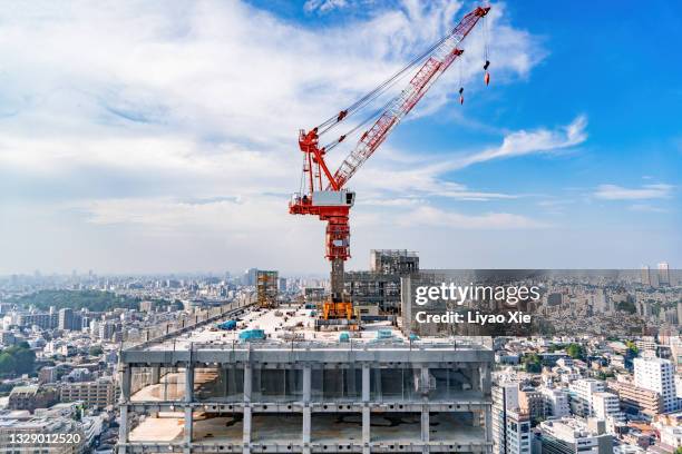 construction site - construction crane asia stock pictures, royalty-free photos & images