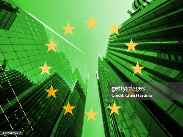 concept piece showing a green eu flag to represent the european unions new low carbon esg climate masterplan of 13 policy proposals spanning energy, shipping, transport and manufacturing. - energy tariff stock pictures, royalty-free photos & images