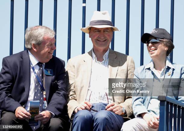 Captain Clive Edginton talking to Princess Anne, Princess Royal and her husband Sir Timothy Laurence during Day Two of The 149th Open at Royal St...