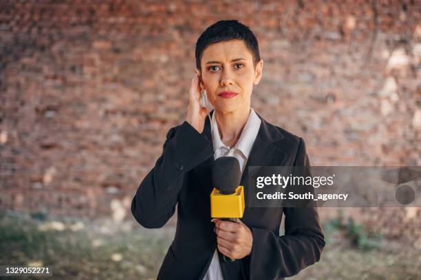 Reporter Example 7,196 Female Reporter With Microphone Stock Photos, High-Res Pictures ...