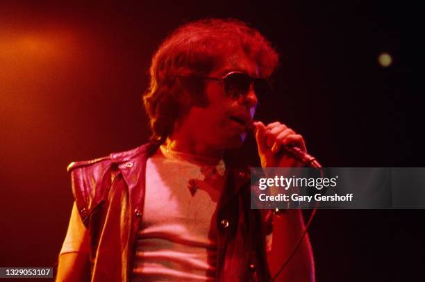 View of English Rock & Blues musician Paul Rodgers, of the band Bad Company, on vocals as he performs, during the 'Desolation Angels' tour, onstage...