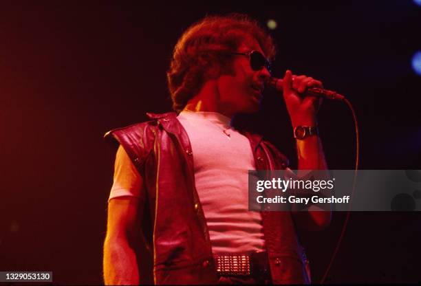 View of English Rock & Blues musician Paul Rodgers, of the band Bad Company, on vocals as he performs, during the 'Desolation Angels' tour, onstage...