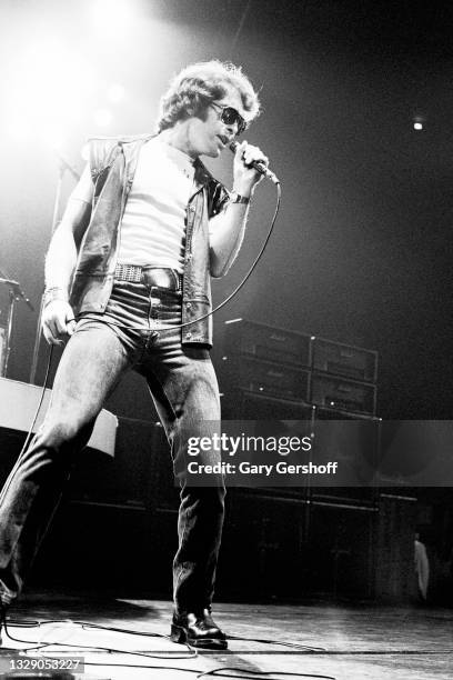 View of English Rock & Blues musician Paul Rodgers, of the band Bad Company, on vocals as he performs, during the 'Desolation Angels' tour, onstage...