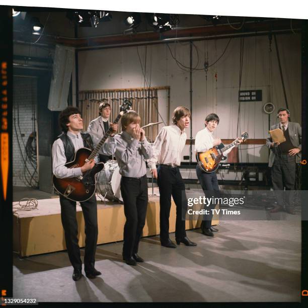 Bill Wyman, Charlie Watts, Brian Jones, Mick Jagger and Keith Richards of English rock group The Rolling Stones performing on the set of Thank Your...