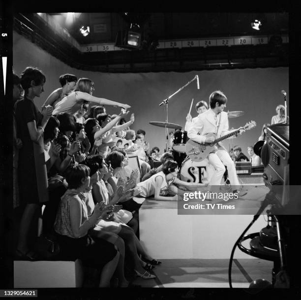 Guitarist Steve Marriott of English rock group The Small Faces performing on the set of an unidentified television show, circa 1966.