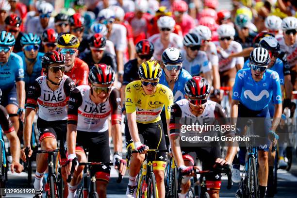 Tadej Pogačar of Slovenia and UAE-Team Emirates yellow leader jersey & The peloton at arrival during the 108th Tour de France 2021, Stage 19 a 207km...