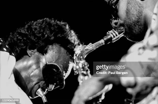 American jazz trumpet player Miles Davis and saxophone player Kenny Garrett perform at North Sea Jazz festival, The Hague, Netherlands, 8 July 1989.