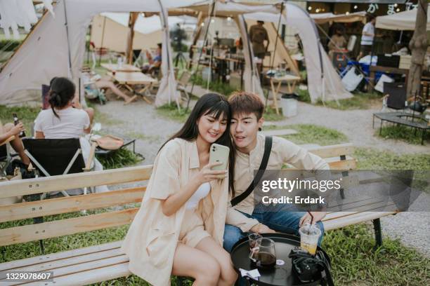 generation z dating time with young asian cute couple at the outdoor cafe -stock photo - asian generation z stock pictures, royalty-free photos & images