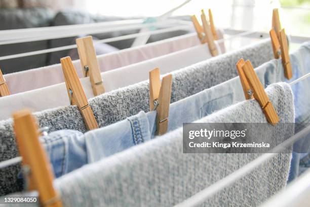 drying clothes - clothesline stockfoto's en -beelden