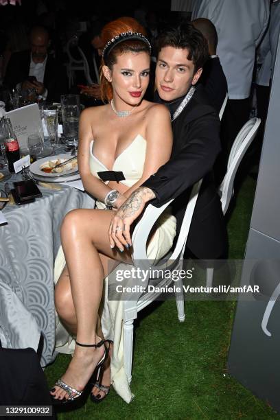 Benjamin Mascolo and Bella Thorne during the amfAR Cannes Gala 2021 at Villa Eilenroc on July 16, 2021 in Cap d'Antibes, France.