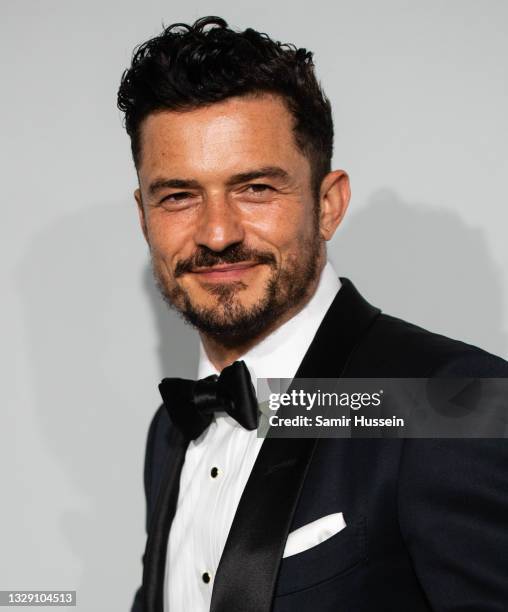 Orlando Bloom attends the amfAR Cannes Gala 2021 during the 74th Annual Cannes Film Festival at Villa Eilenroc on July 16, 2021 in Cap d'Antibes,...