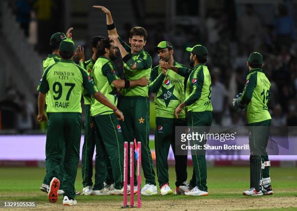 Shaheen Shah Afridi of Pakistan celebrates with team mates after taking the final wicket during the first Vitality International T20 match between...
