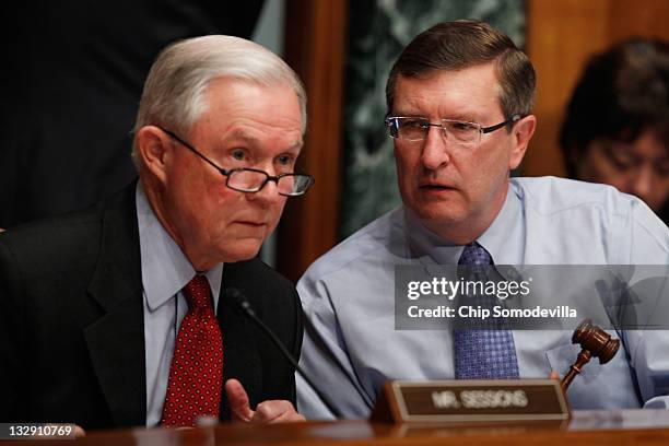 Senate Budget Committee Chairman Sen. Kent Conrad listens to ranking member Sen. Jeff Sessions question Congressional Budget Office Director Doug...