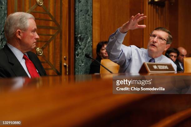 Senate Budget Committee Chairman Sen. Kent Conrad debates with ranking member Sen. Jeff Sessions during a hearing on Capitol Hill November 15, 2011...
