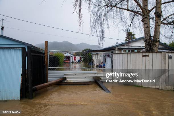 House flooded in Riwaka on July 17, 2021 in Nelson, New Zealand. Heavy rain and flooding has led to road closures across New Zealand's South Island.