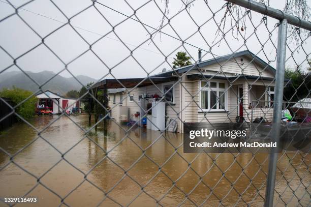 Property flooded in Riwaka on July 17, 2021 in Nelson, New Zealand. Heavy rain and flooding has led to road closures across New Zealand's South...