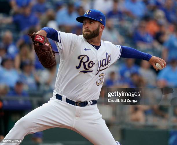 Starting pitcher Danny Duffy of the Kansas City Royals throws in the first inning against the Baltimore Orioles at Kauffman Stadium on July 16, 2021...