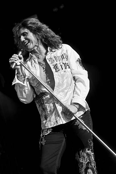 https://media.gettyimages.com/id/132914398/photo/david-coverdale-of-rock-group-whitesnake-performing-live-on-stage-at-download-festival-on-june.jpg?s=612x612&w=0&k=20&c=yFZHg60ojgpPYC7oZuBFy-F3amAr3I2big7o5DnctYs=